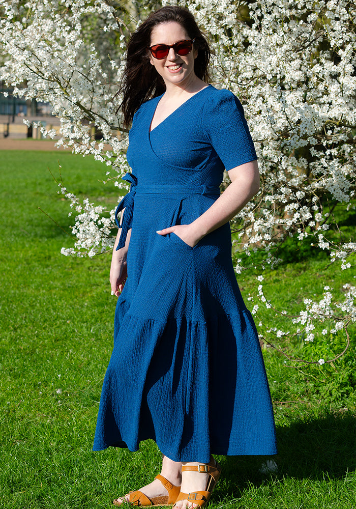 Front view of Sol Indigo Crinkle Tiered Hem Midaxi Dress