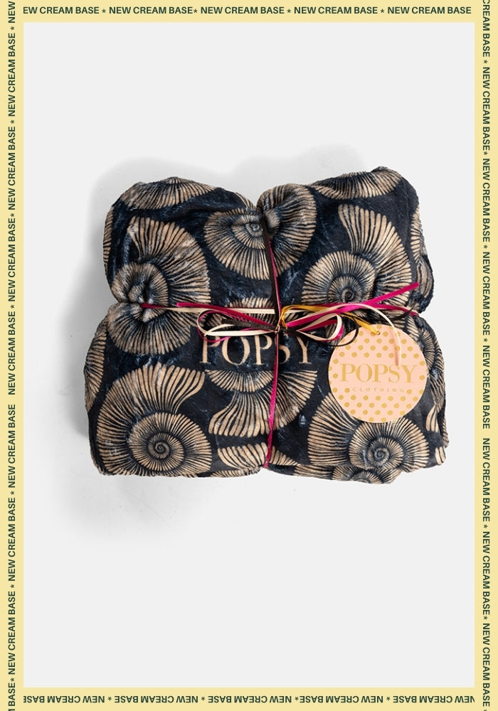 Front view of Pop-under Fossil Print Plush Blanket