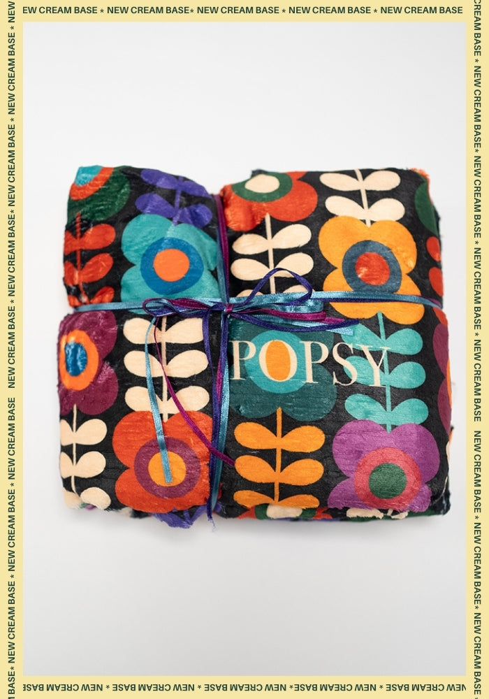 Front view of Retro Flower Pop-under Plush Blanket