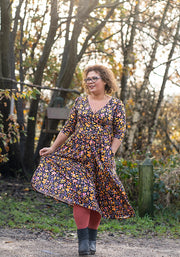 Lexie Ditsy Floral Print Tiered Hem Midi Dress