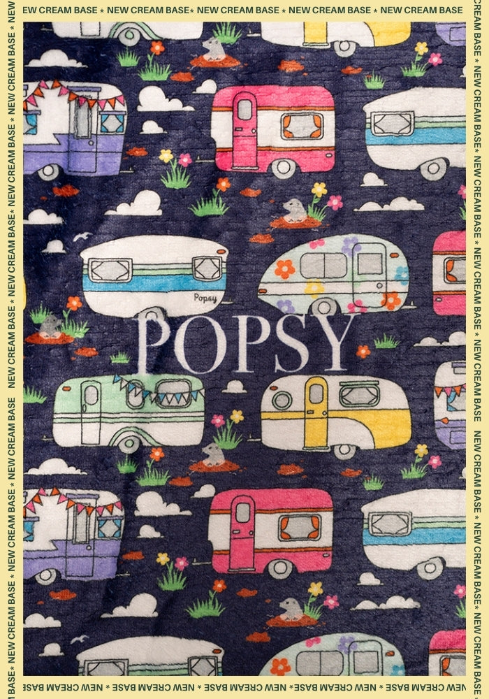 Second angle of Caravan Print Pop-under Plush Blanket
