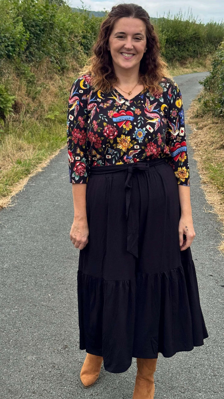 Fifth angle of Bina Black Tiered Hem Viscose Midi Skirt