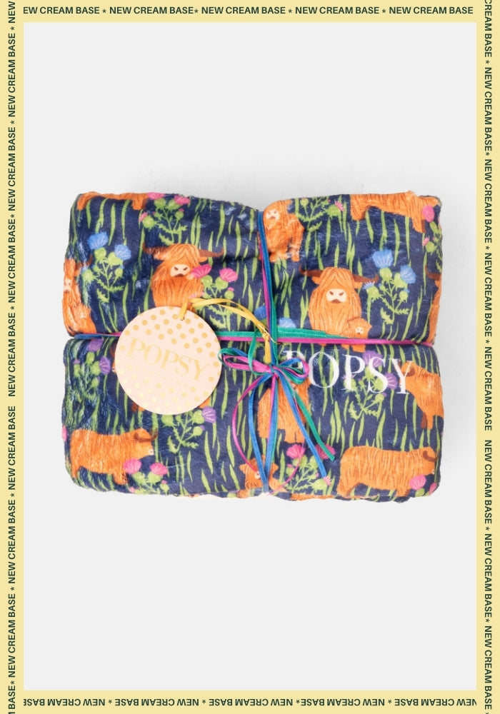 Front view of Pop-under Highland Cow Print Plush Blanket