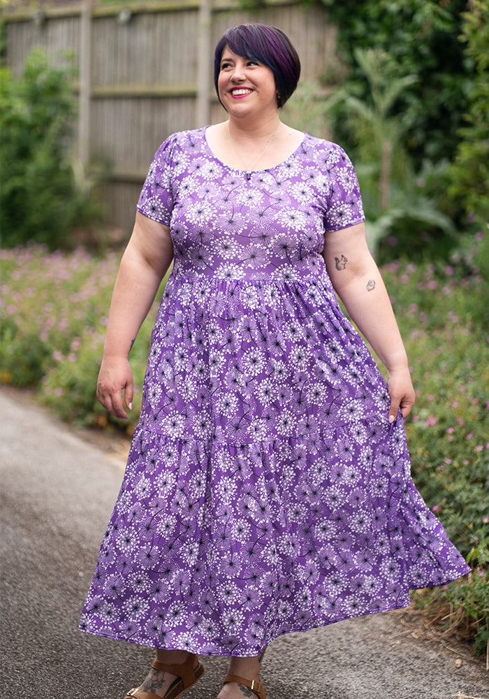 Front view of Abbi Dandelion Print Tiered Hem Midaxi Dress