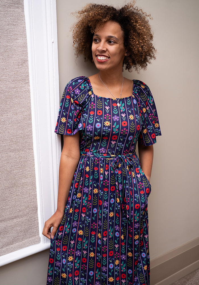 Third angle of Adalee Floral Stripe Print Midi Dress