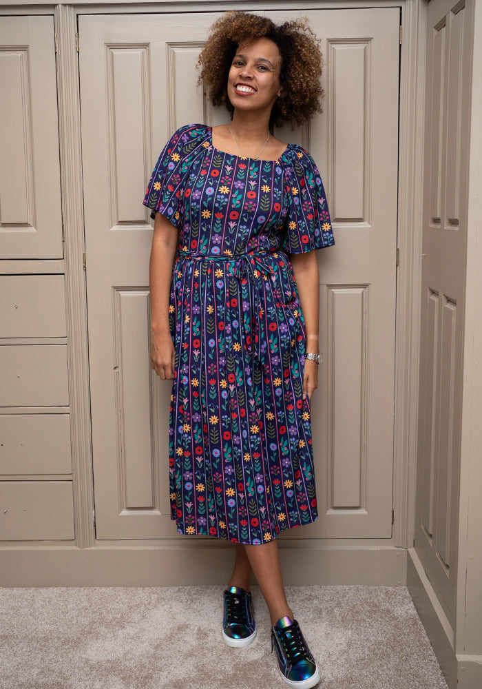 Front view of Adalee Floral Stripe Print Midi Dress