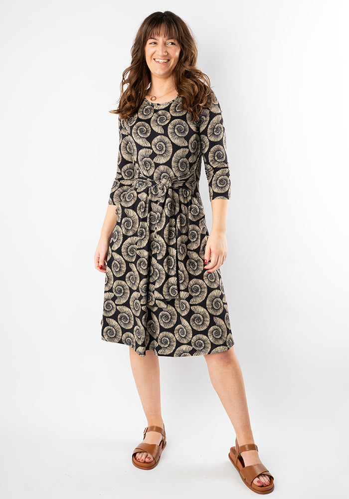 Front view of Ammonite Fossil Print Tie Waist Viscose Dress