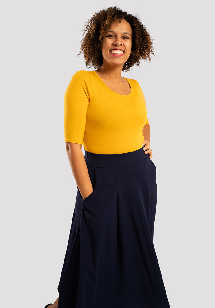 Third angle of Ann Navy Vintage Box Pleat Swing Skirt