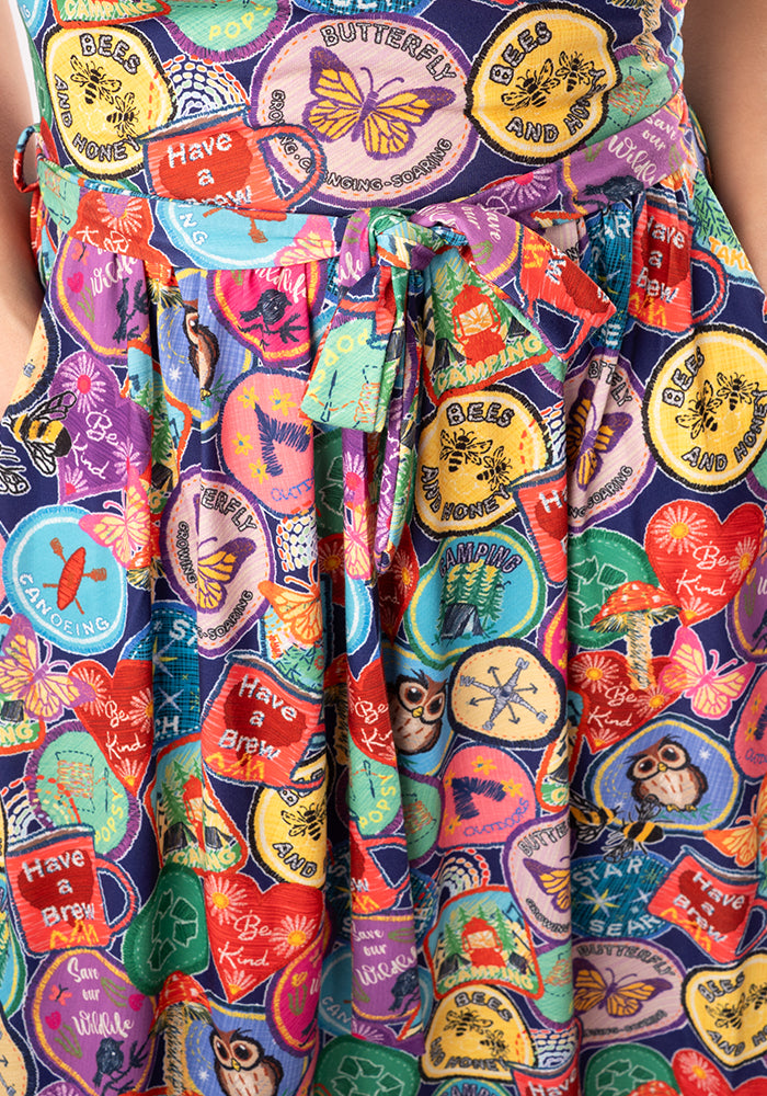 Fifth angle of Annika Badges Print Dress, our jersey is a smooth, stretchy fabric known for its comfort and ease.