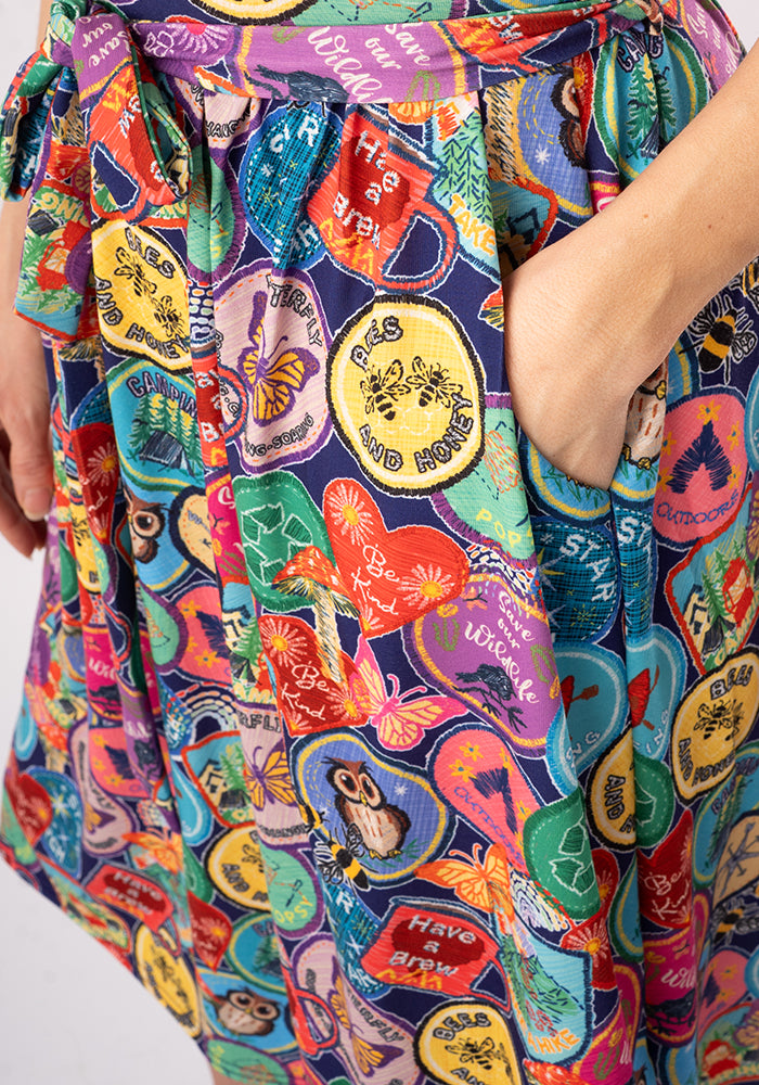 Eighth angle of Annika Badges Print Dress, our jersey is a smooth, stretchy fabric known for its comfort and ease.
