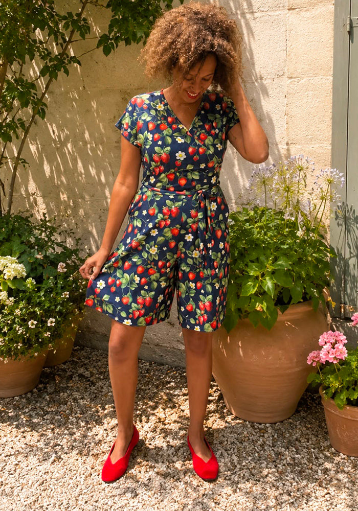 Front view of Ariane Navy Strawberries Print Playsuit, a stylish navy playsuit with a strawberries pattern.