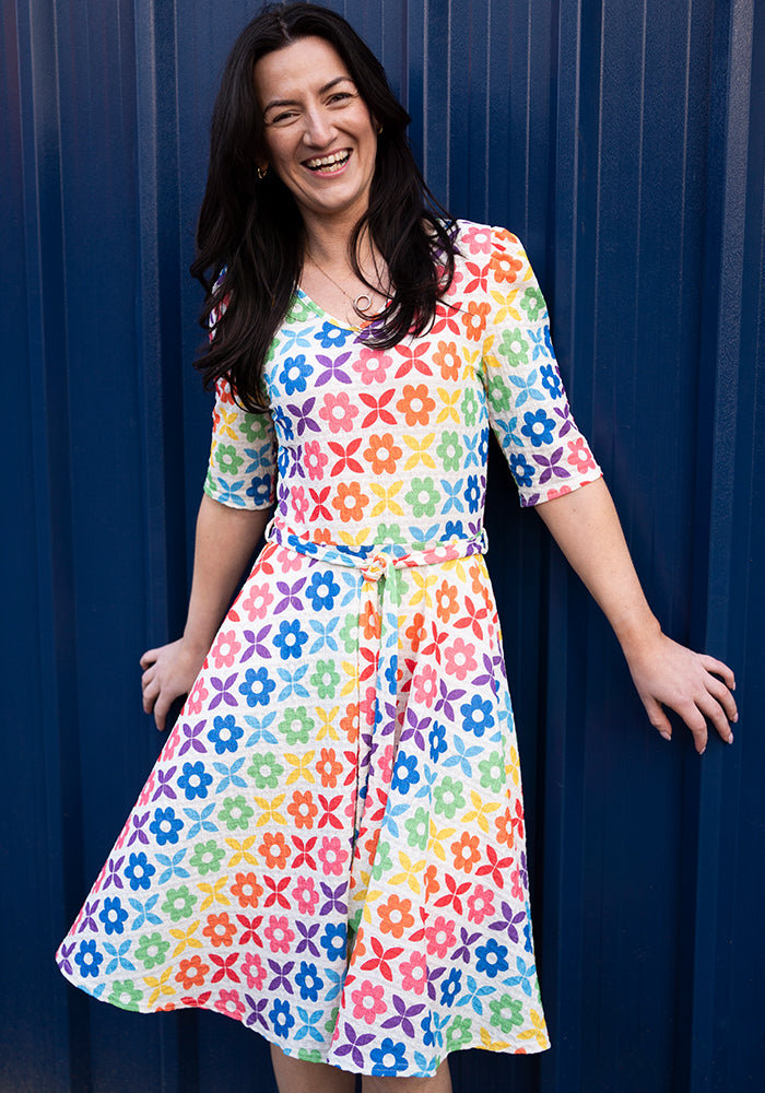 Front view of Averee Retro Rainbow Floral Print Dress (Cream)