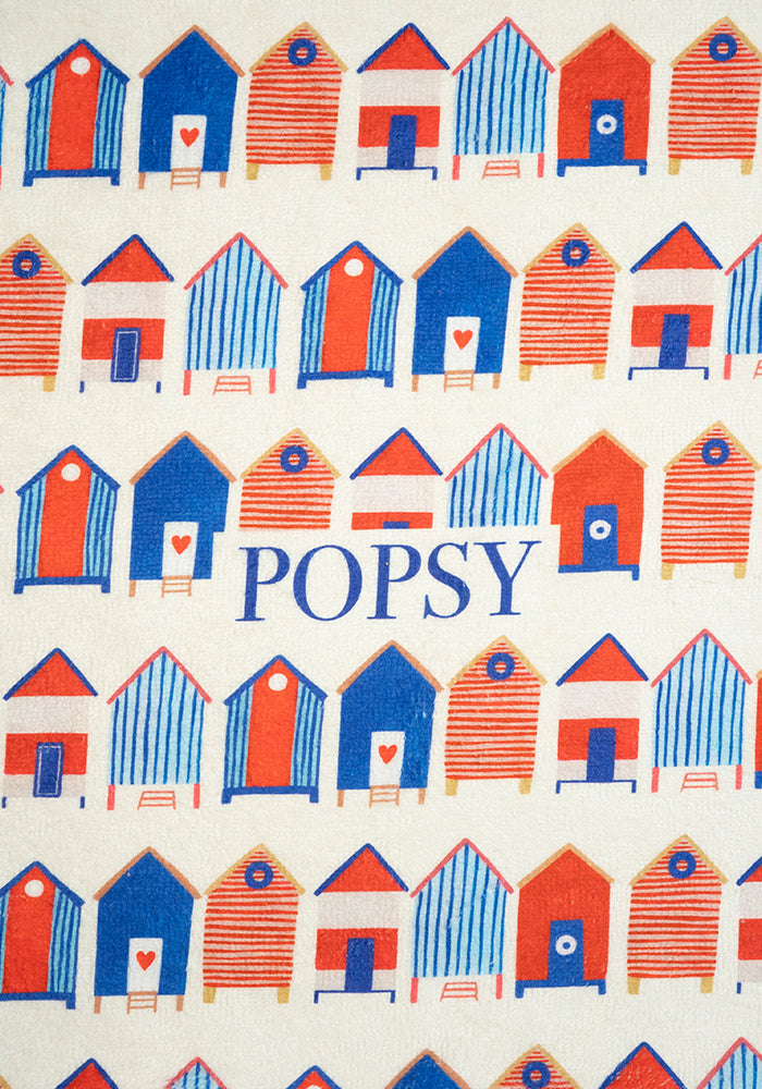 Second angle of Beach Hut Print Jumbo Bath Sheet, a jumbo bath sheet with a classic beach holiday vibe.