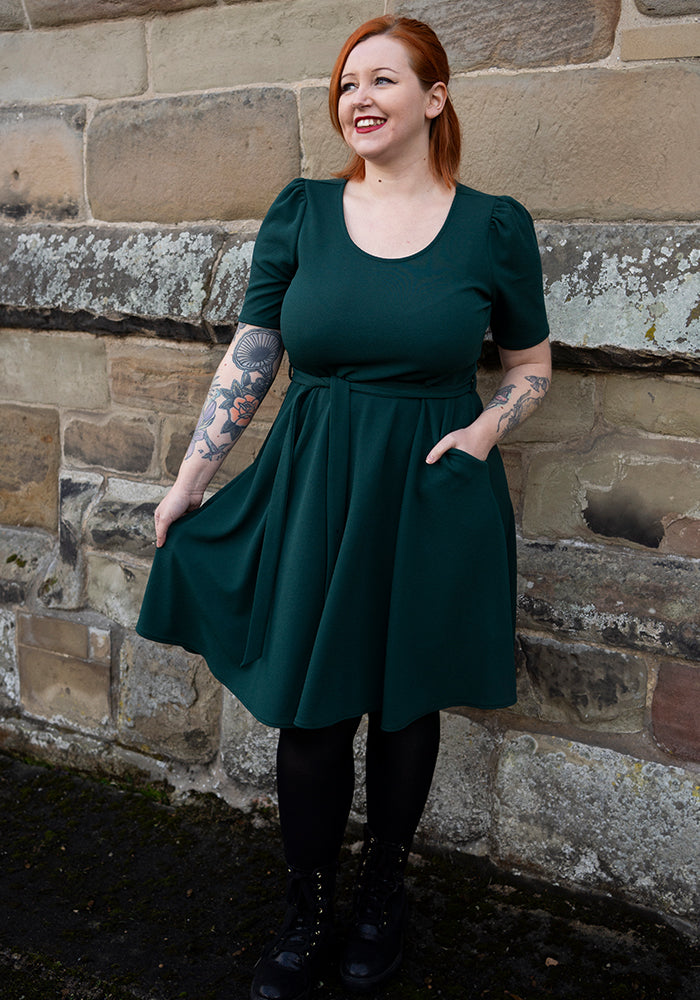 Front view of Becca Bottle Green Textured Crepe Dress