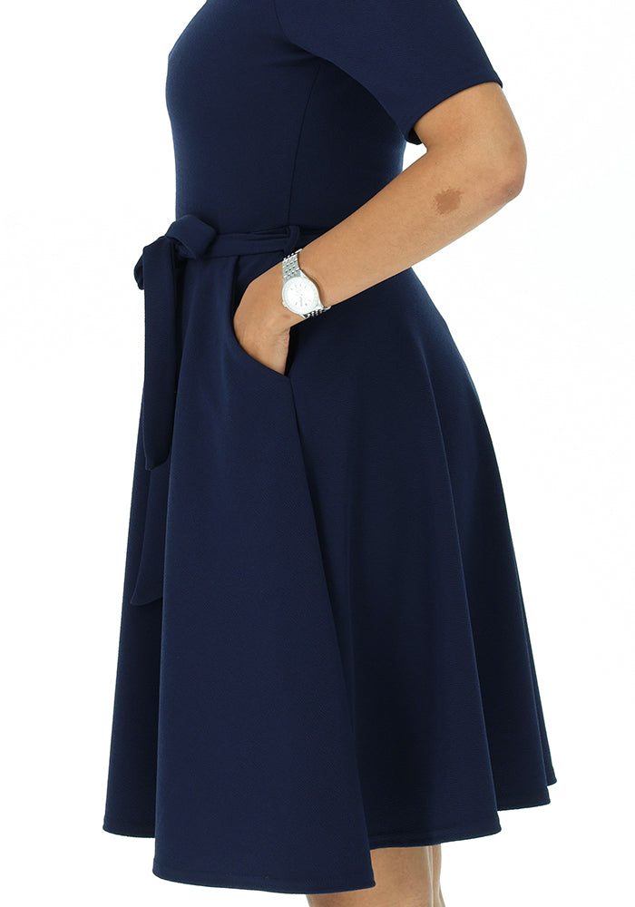 Third angle of Becca Navy Textured Crepe Dress