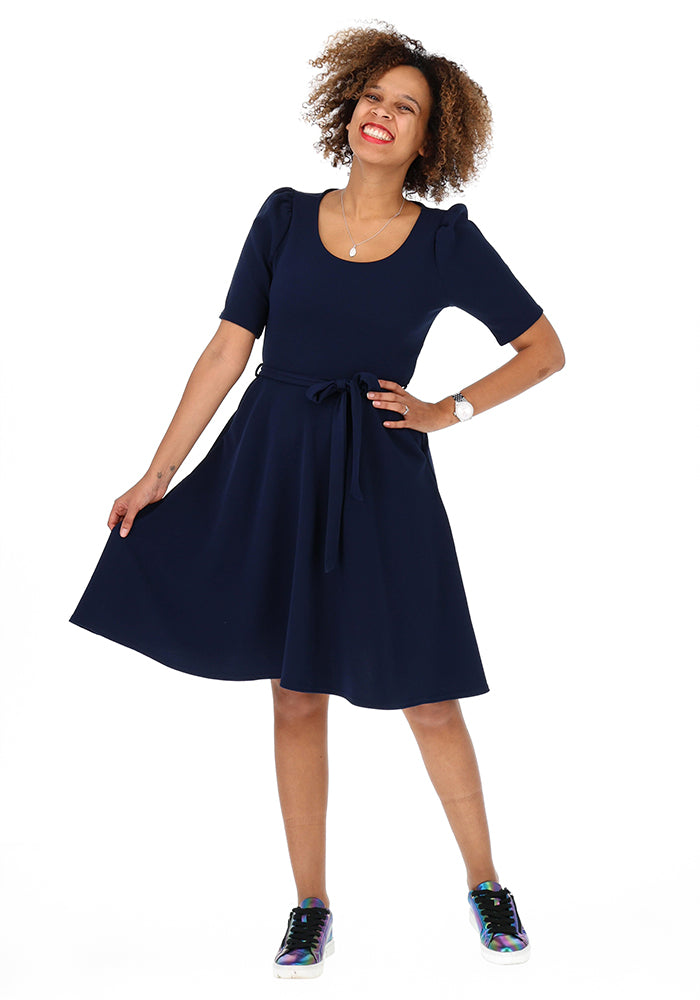 Front view of Becca Navy Textured Crepe Dress