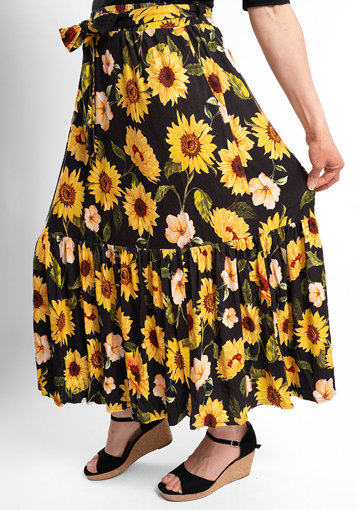 Front view of Bina Sunflower Print Viscose Tiered Hem Midi Skirt
