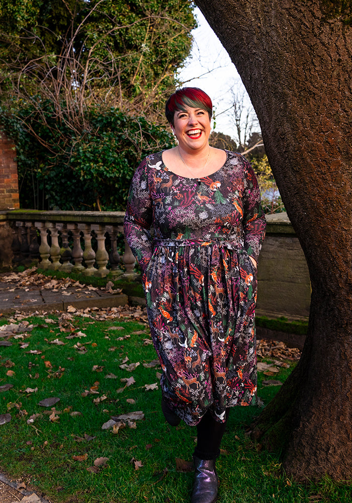 Front view of Birkley Animal Forest Print Midi Dress