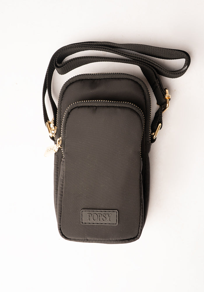 Third angle of Black Phone Pocket Bag, a classic black phone pocket bag is the must-have accessory in every woman&