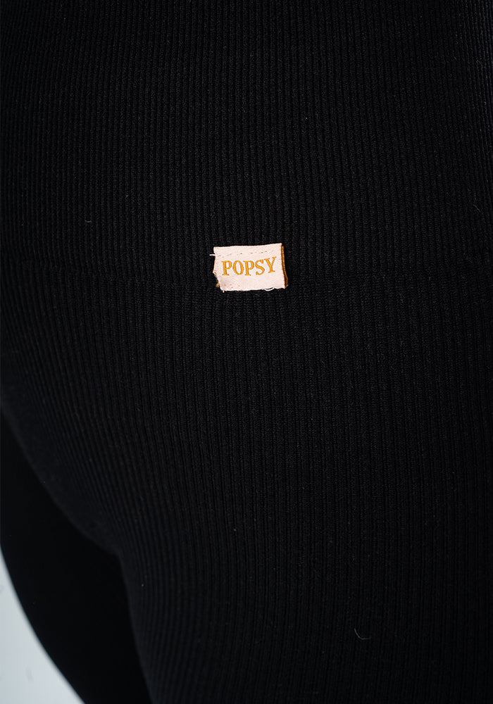 Third angle of Black Ribbed Popsy Leggings