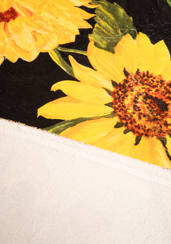 Third angle of Black Sunflower Print Jumbo Bath Sheet