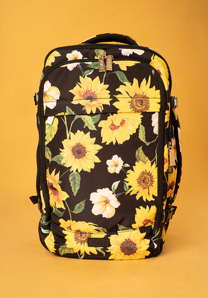 Front view of Black Sunflower Print Cabin Bag, a stylish cabin bag with a bold floral sunflower pattern.