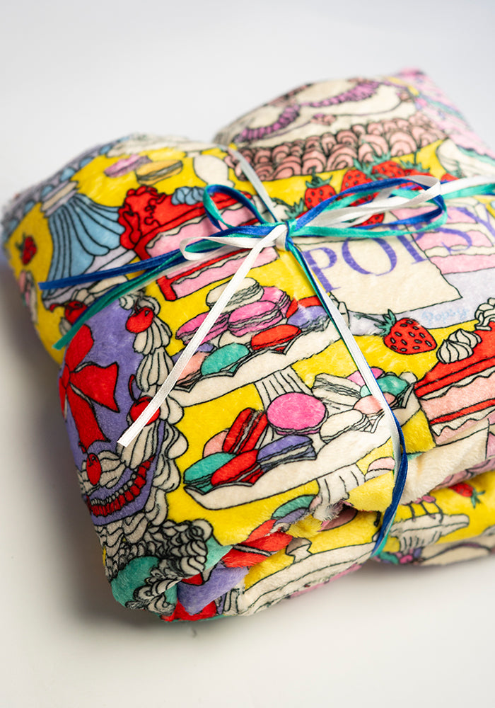 Fourth angle of Patisserie Print (Lemon) Plush Throw Blanket (Pop-Under)