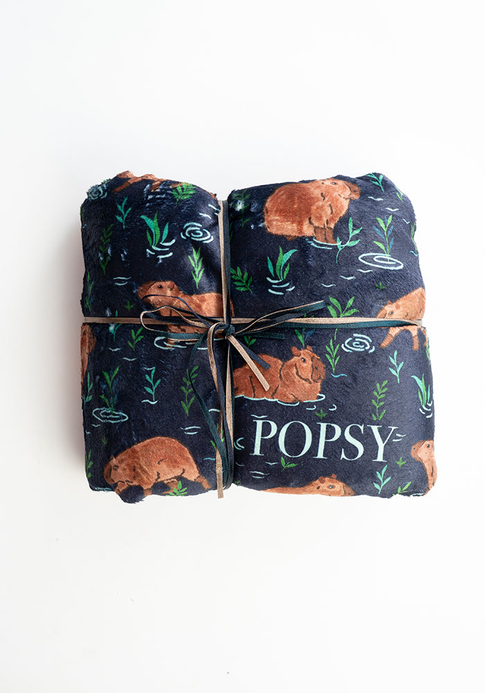 Front view of Capybara Print Plush Throw Blanket (Pop-Under)