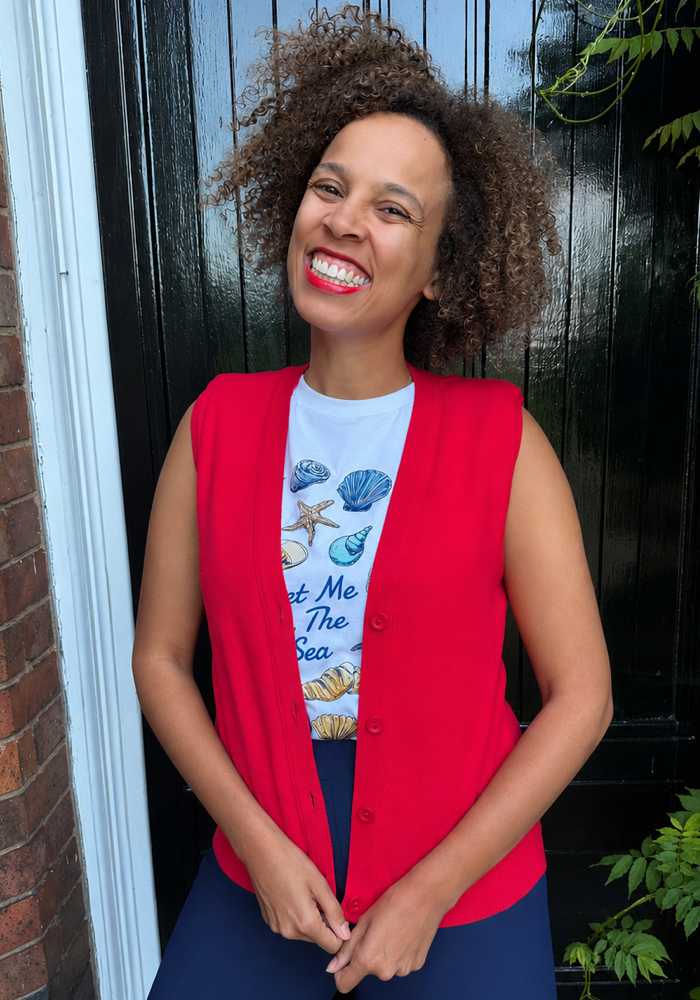 Front view of Red Sleeveless Cardigan, a bold red sleeveless cardigan perfect for all year styling from Popsy Clothing.