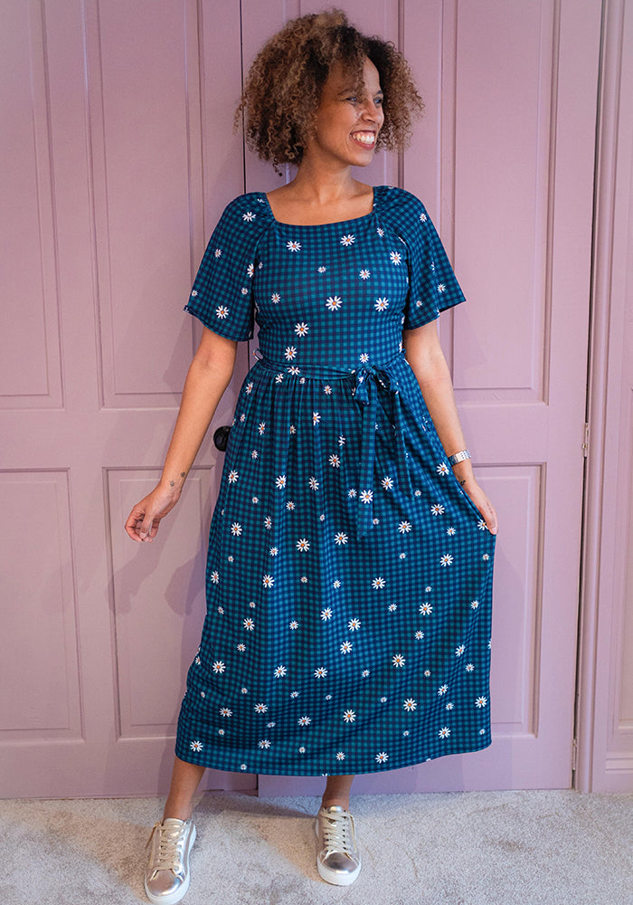 Front view of Chloebelle Gingham Check Daisy Print Jersey Midaxi Dress