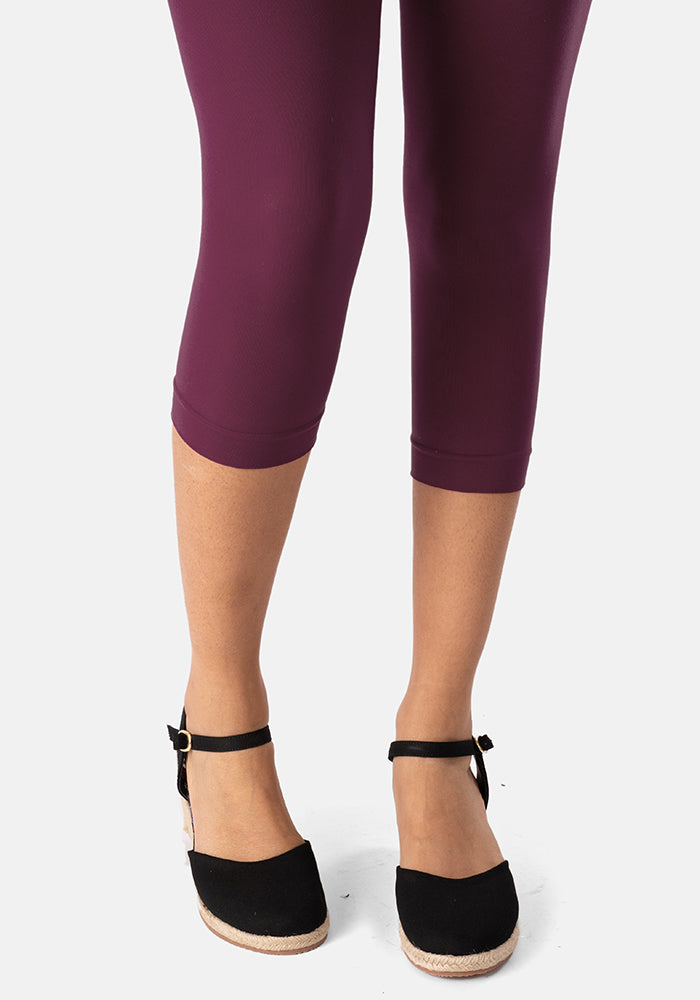 Front view of 50 Denier Premium Capri Tights (Damson), add a touch of colour with our rich Damson 50 denier Capri tights.