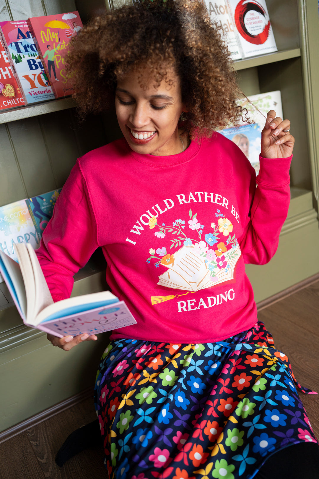 Front view of Rather Be Reading Print Sweatshirt (Hot Pink)