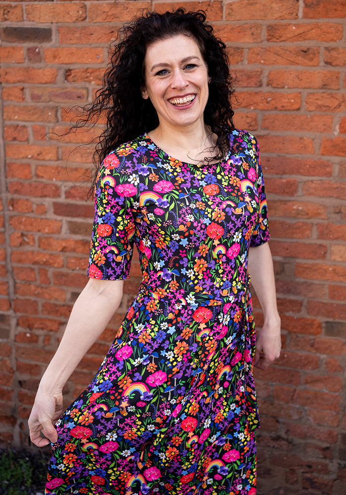 Front view of Dayanne Garden Rainbow Floral Print Dress
