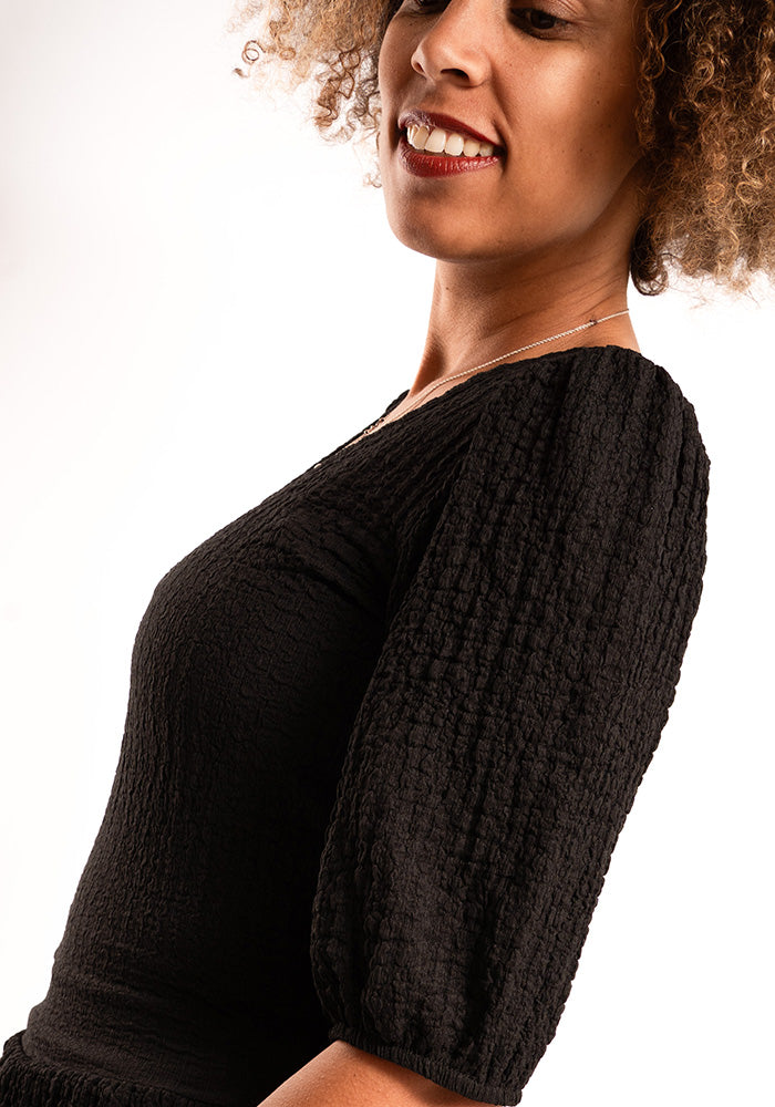 Third angle of Deia Black Peplum Top