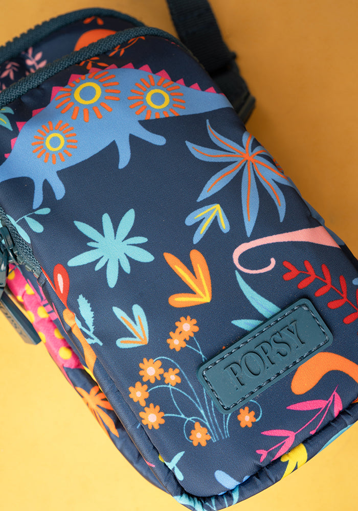 Third angle of Teal Dinosaur Print Phone Pocket Bag, teal Dinosaur Phone Pocket Bag with fun print.