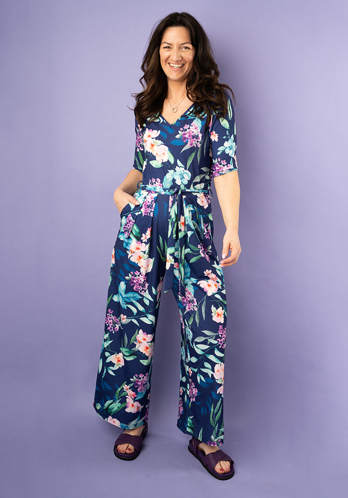 Front view of Dutton Navy Occasion Floral Print Culotte Leg Jumpsuit