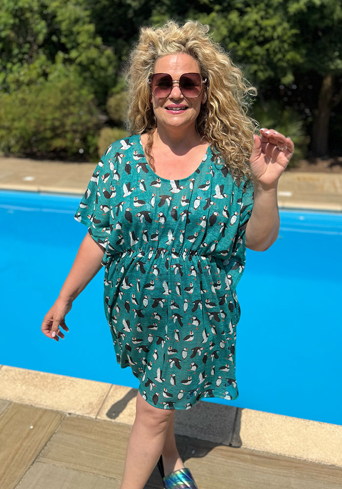 Third angle of Dylan Teal Puffin Print Cover Up, a seaside inspired puffin print cover up from Popsy Clothing.