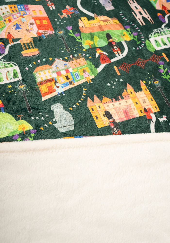 Fourth angle of Edinburgh Print Pop-under Plush Throw Blanket (Pop-Under), a cosy blanket with an Edinburgh inspired print.