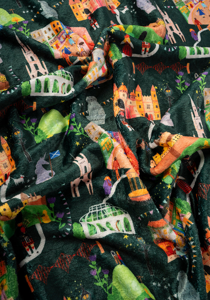 Second angle of Edinburgh Print Pop-under Plush Throw Blanket (Pop-Under), a cosy blanket with an Edinburgh inspired print.