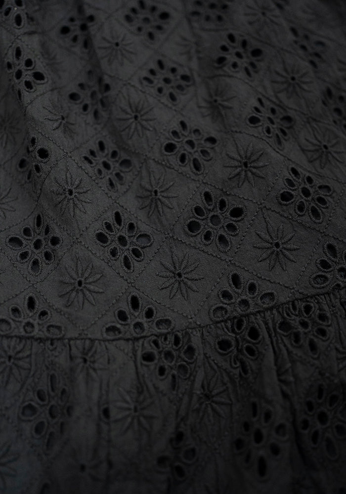 Second angle of Emblyn Black Broderie Anglaise Cotton Tiered Dress