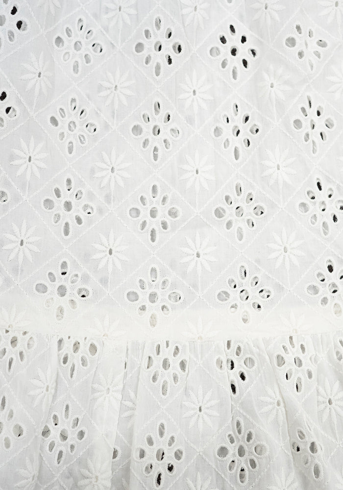 Second angle of Emblyn White Broderie Anglaise Cotton Tiered Dress