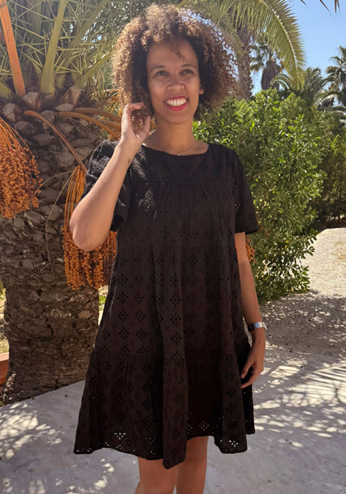 Front view of Emblyn Black Broderie Anglaise Cotton Tiered Dress