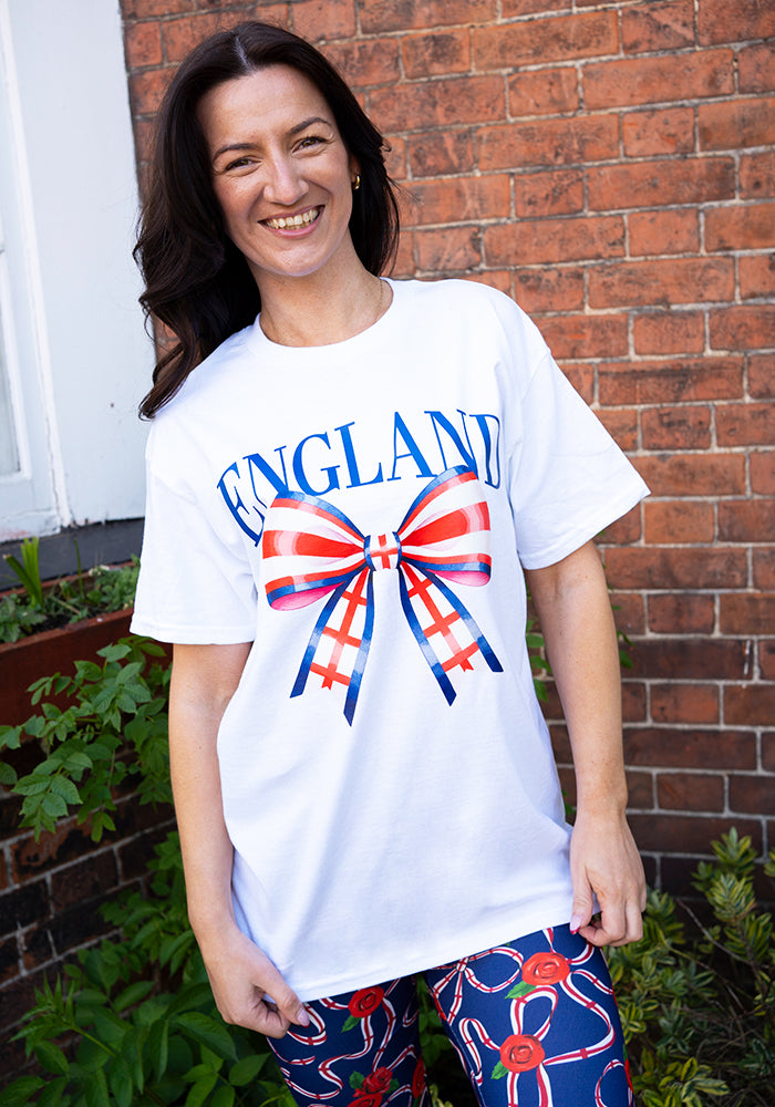 Front view of White England Graphic T-Shirt, a crisp white t-shirt on cotton fabric with an England inspired graphic.