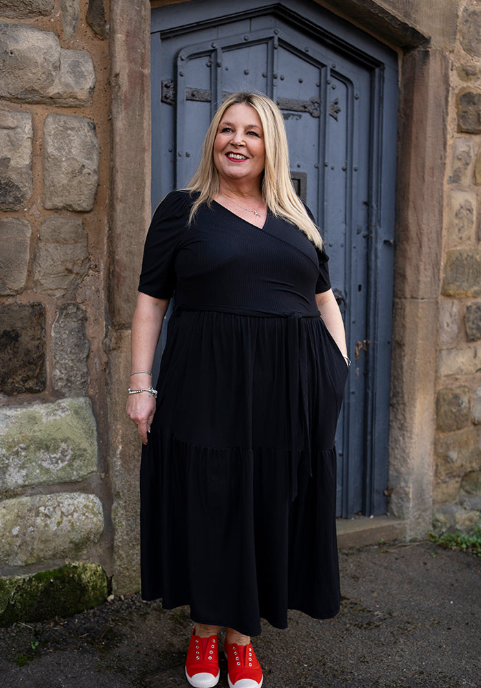 Sixth angle of Evie Black Rib Brush Tiered Hem Midi Dress