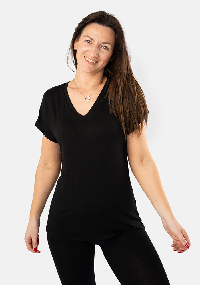 Front view of Black Extended Shoulder V-Neck Top, this viscose elastane blend is soft, breathable, and beautifully drapey.