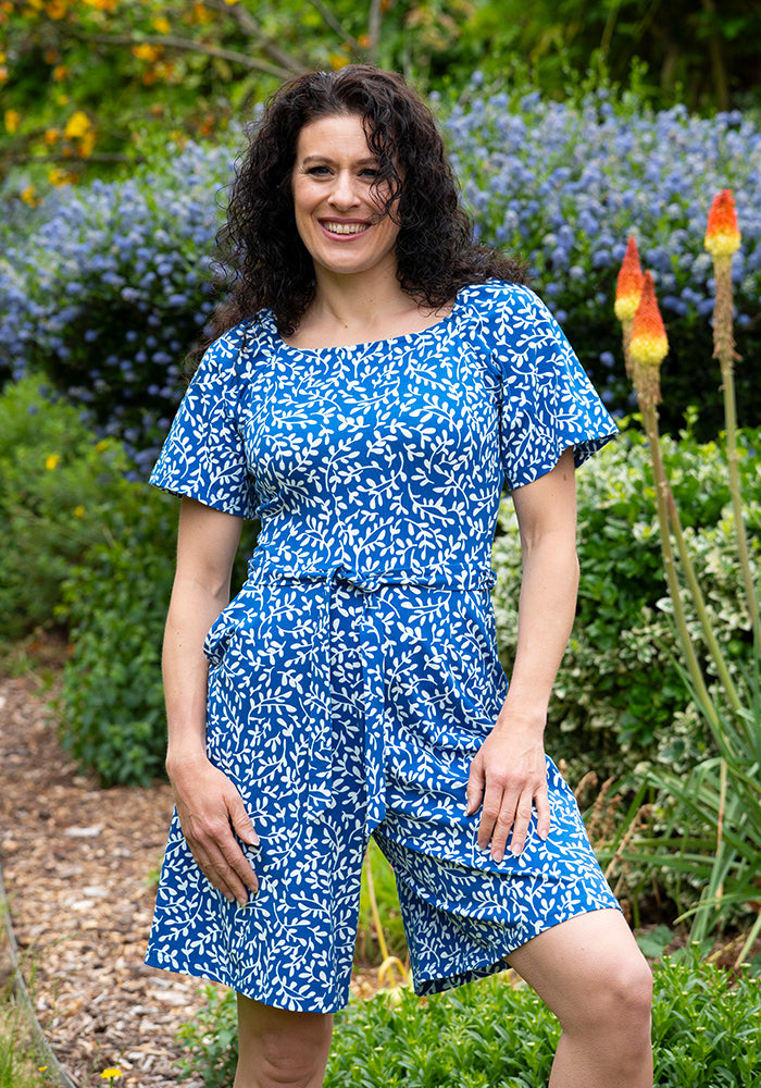 Front view of Fia Blue Sprig Print Cotton Playsuit, blue and white cotton playsuit with all-over sprig pattern.