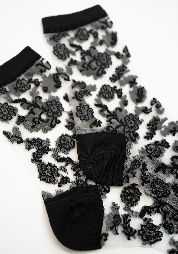 Second angle of Black Floral Bloom Sheer Ankle Socks, effortlessly stylish black sheer ankle socks.