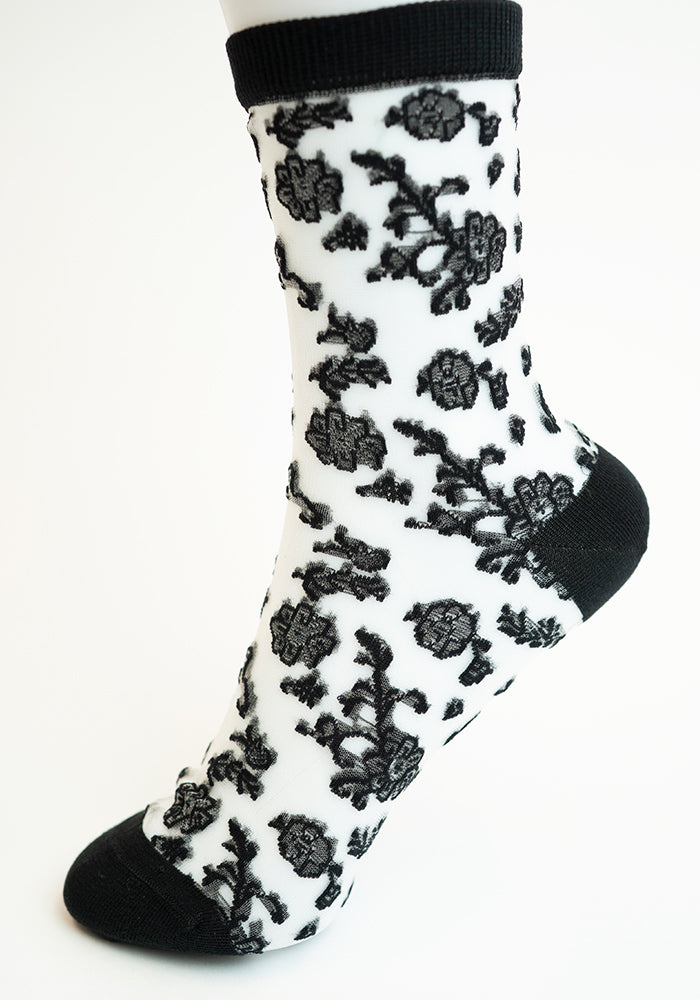 Front view of Black Floral Bloom Sheer Ankle Socks, effortlessly stylish black sheer ankle socks.