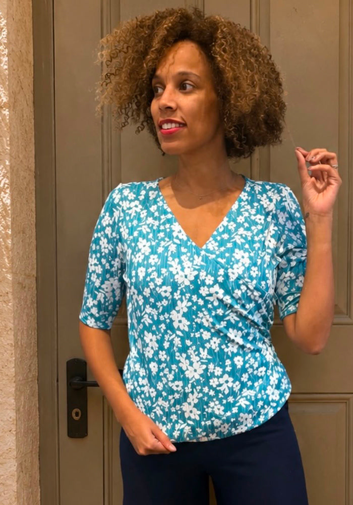 Front view of Ditsy Print Wrap Neck Top, a ditsy daisy print wrap neck top.