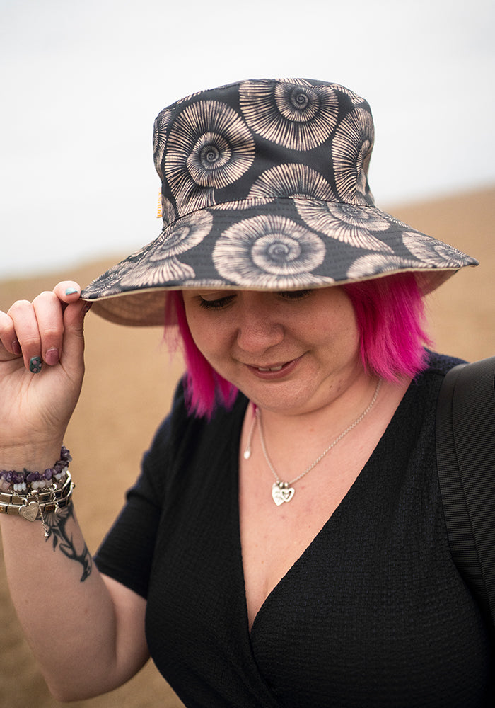Front view of Fossil Print Reversible Bucket Hat, fossil Print Reversible Bucket Hat Fun, practical and made for sunny days.